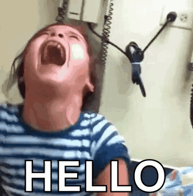 A Little Boy Is Screaming With His Mouth Open And The Words Hello Written On The Bottom Of His Face . GIF