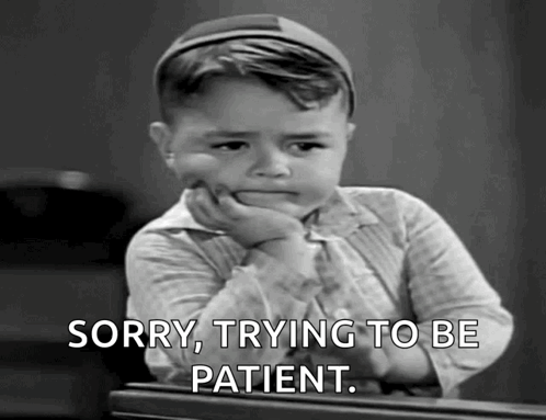 A Little Boy Is Sitting At A Table With His Hand On His Chin And The Words Sorry Trying To Be Patient . GIF