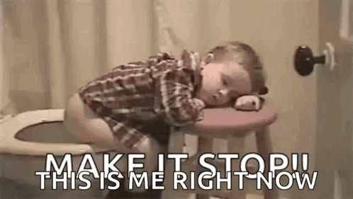 A Little Boy Is Sleeping On A Stool In Front Of A Toilet . GIF