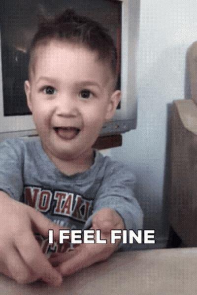 A Little Boy Wearing A Shirt That Says " No Tak " Is Smiling And Saying " I Feel Fine " GIF