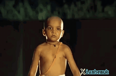A Little Boy With A Tear Running Down His Face And The Words Xlamhamuk On The Bottom Right GIF