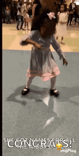 A Little Girl In A Dress Is Dancing With The Caption She Got Names For All The A.i. Guys GIF