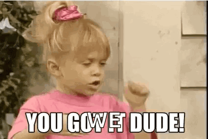 A Little Girl In A Pink Shirt Is Making A Funny Face And Saying `` You Gowet Dude '' . GIF