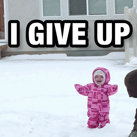A Little Girl In A Pink Snowsuit Is Standing In The Snow With The Words I Give Up Behind Her GIF