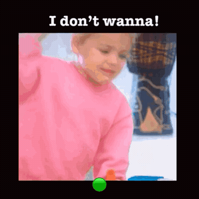 A Little Girl In A Pink Sweater Is Playing With A Green Ball And The Words I Don 'T Wanna Are Above Her . GIF