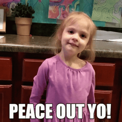 A Little Girl In A Purple Dress Stands In Front Of A Counter With The Words Peace Out Yo GIF