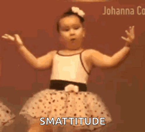 A Little Girl In A Tutu Is Dancing And The Words " Smattitude " Are Visible GIF