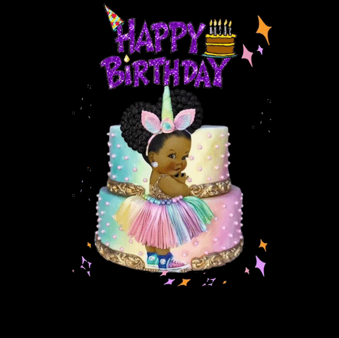 A Little Girl In A Unicorn Outfit Is Standing Next To A Birthday Cake GIF