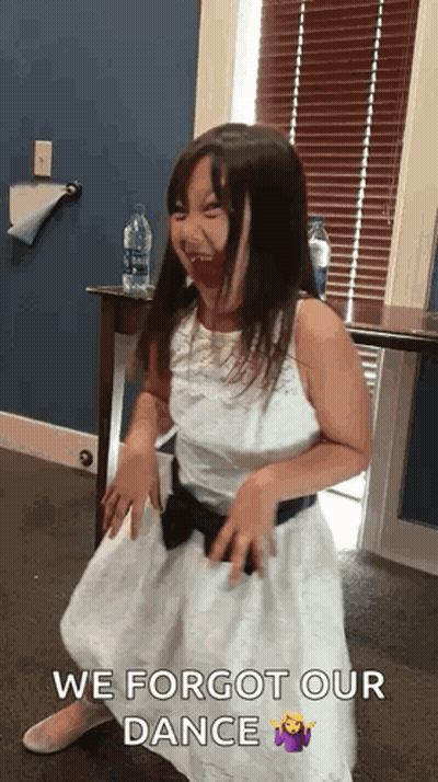 A Little Girl In A White Dress Is Dancing With The Words We Forgot Our Dance Above Her . GIF