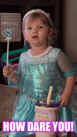 A Little Girl In An Elsa Costume Is Holding A Wand And A Cup With The Words How Dare You Written On The Bottom GIF