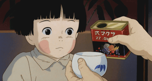 A Little Girl Is Being Offered A Cup Of Tea By A Person Holding A Can With Chinese Writing On It GIF