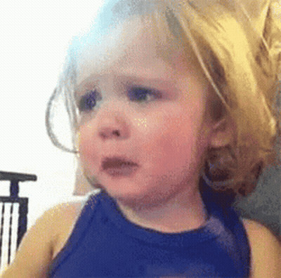 A Little Girl Is Crying And Making A Funny Face . GIF