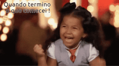 A Little Girl Is Crying With The Words " Quando Termine O Que Comecei " Behind Her GIF