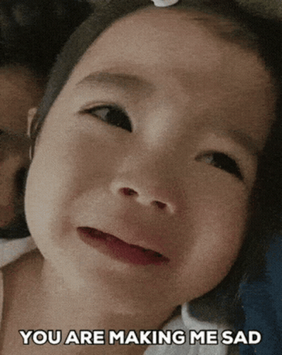 A Little Girl Is Crying With The Words " You Are Making Me Sad " On The Bottom GIF