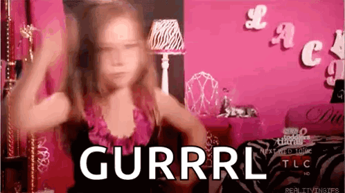 A Little Girl Is Dancing In A Room With The Word Gurrrl On The Wall . GIF