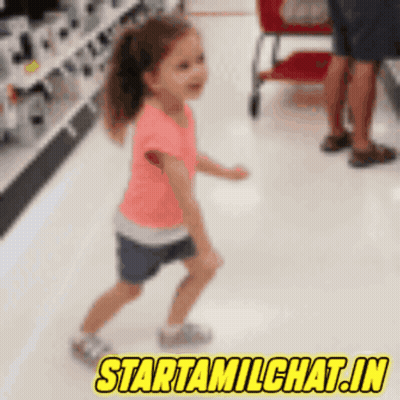 A Little Girl Is Dancing In A Store With The Words Starttamilchat.in GIF