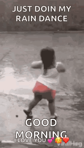 A Little Girl Is Dancing In The Rain And Says `` Just Doin My Rain Dance '' . GIF