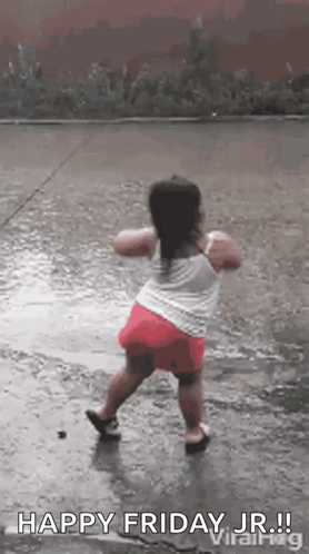 A Little Girl Is Dancing In The Rain On Friday Jr . GIF