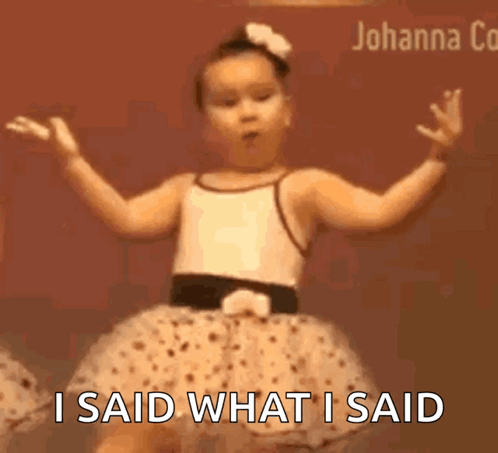 A Little Girl Is Dancing With The Words I Said What I Said Behind Her GIF