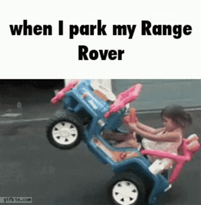 A Little Girl Is Driving A Toy Rover GIF
