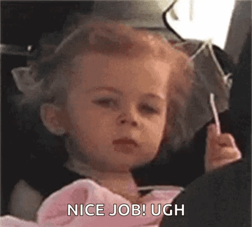 A Little Girl Is Holding A Lollipop And Saying `` Nice Job ! '' GIF