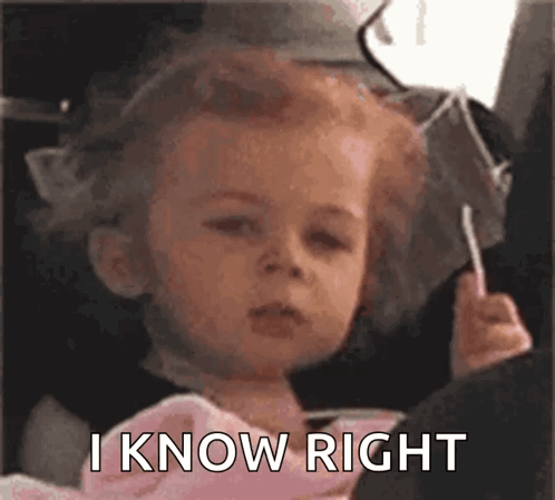A Little Girl Is Holding A Lollipop In Her Hand And Says I Know Right . GIF
