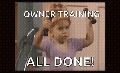 A Little Girl Is Holding A Pair Of Dumbbells Over Her Shoulder . GIF