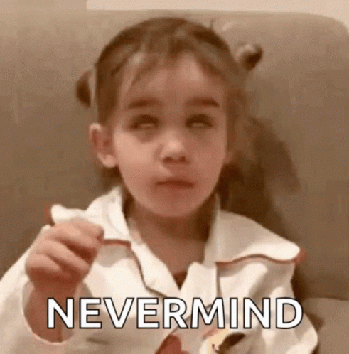 A Little Girl Is Holding A Piece Of Paper With The Word Nevermind On It . GIF