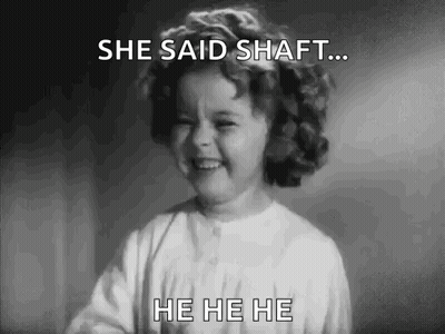A Little Girl Is Laughing In A Black And White Photo . GIF