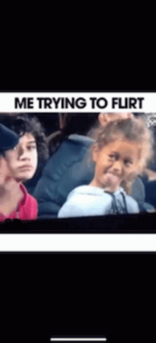 A Little Girl Is Making A Face While Sitting In A Car With Other People . GIF