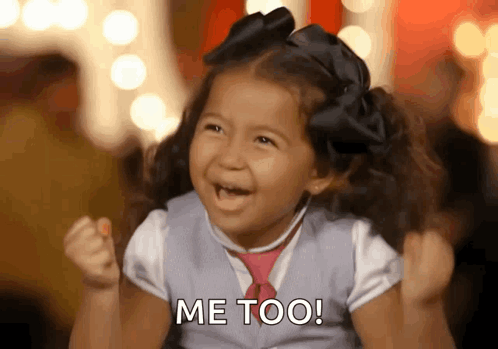 A Little Girl Is Making A Funny Face And Saying Me Too GIF