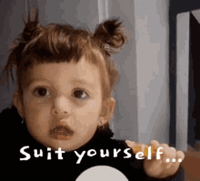 A Little Girl Is Making A Funny Face And Saying Suit Yourself GIF