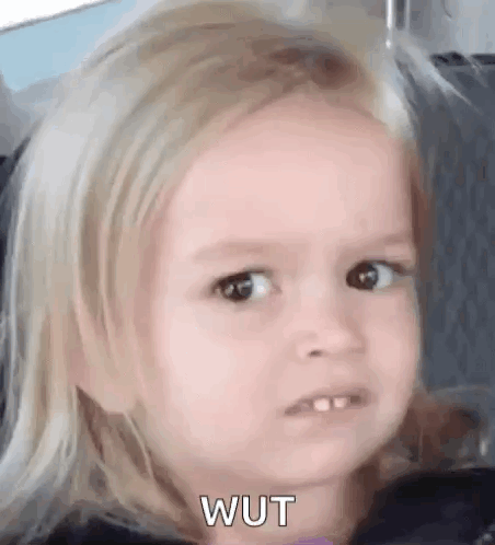 A Little Girl Is Making A Funny Face While Sitting In A Car . GIF