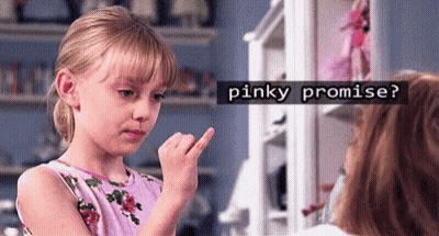 A Little Girl Is Making A Pinky Promise To Another Little Girl . GIF
