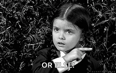 A Little Girl Is Pointing At Something In A Black And White Photo And Says `` Or Else '' . GIF