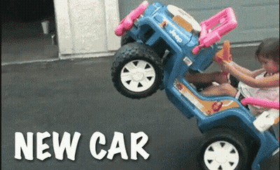 A Little Girl Is Sitting In A Blue Jeep With The Words " New Car " On The Bottom GIF
