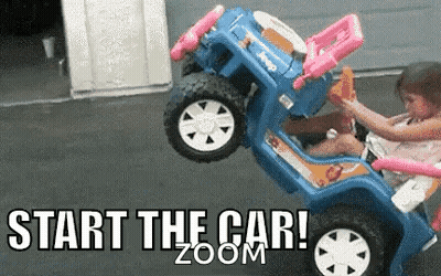 A Little Girl Is Sitting In A Blue Toy Car With The Words Start The Car Zoom Written On The Bottom . GIF