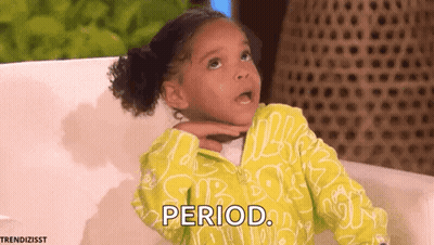 A Little Girl Is Sitting On A Couch And Making A Funny Face And Saying Period . GIF