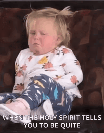 A Little Girl Is Sitting On A Couch With Her Eyes Closed And The Holy Spirit Tells Her To Be Quite . GIF