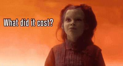A Little Girl Is Standing In Front Of A Red Background And Asking What Did It Cost . GIF