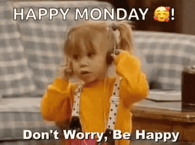 A Little Girl Is Wearing Headphones And Talking On A Phone . GIF