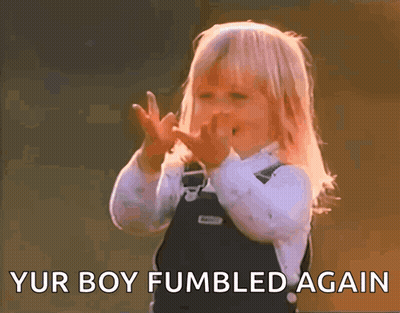 A Little Girl Making A Funny Face With The Words " Yur Boy Fumbled Again " Behind Her GIF