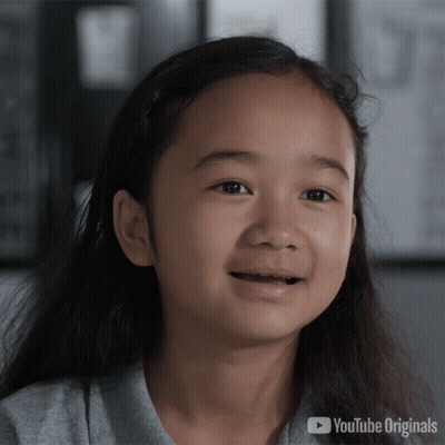 A Little Girl 'S Face Is Shown In A Youtube Originals Ad GIF