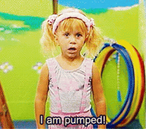 A Little Girl Says I Am Pumped While Standing In Front Of Hula Hoops GIF