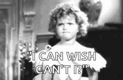 A Little Girl Says " I Can Wish Can 'T I " In A Black And White Photo . GIF