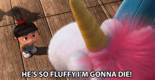 A Little Girl Standing Next To A Stuffed Animal With The Words He 'S So Fluffy I 'M Gonna Die GIF