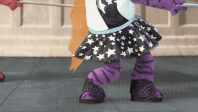 A Little Girl Wearing A Black And White Skirt With Stars On It GIF
