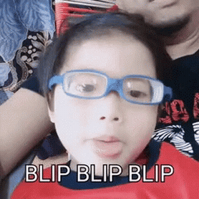 A Little Girl Wearing Glasses With The Words Blip Blip Blip Written Below Her GIF