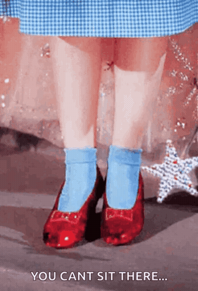 A Little Girl Wearing Red Shoes And Blue Socks Says You Can 'T Sit There GIF