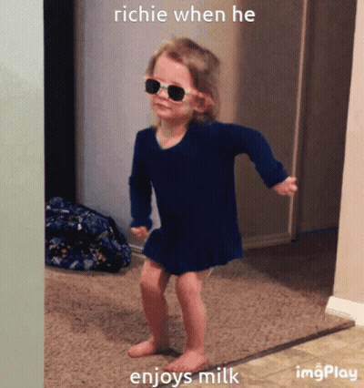 A Little Girl Wearing Sunglasses And A Blue Dress Dancing With The Caption Richie When He Enjoys Milk GIF